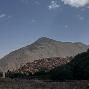 Panoramic view of Mount Toubkal with surrounding Berber villages in the High Atlas Mountains. Panoramic view of Mount Toubkal with surrounding Berber villages in the High Atlas Mountains.