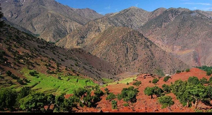 View toward Mount Toubkal from a high ridge, showing the summit and wide rocky slopes under clear morning light — a clean visual summary of the trek’s key highlights View toward Mount Toubkal from a high ridge, showing the summit and wide rocky slopes under clear morning light — a clean visual summary of the trek’s key highlights