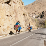 Marrakech to Imlil road transitioning from city landscape to High Atlas foothills