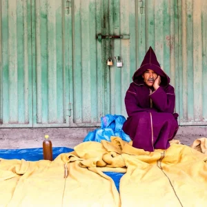 A local Amazigh resident of the Imlil Valley, showing the daily life in the village and the authentic cultural atmosphere. A local Amazigh resident of the Imlil Valley, showing the daily life in the village and the authentic cultural atmosphere.