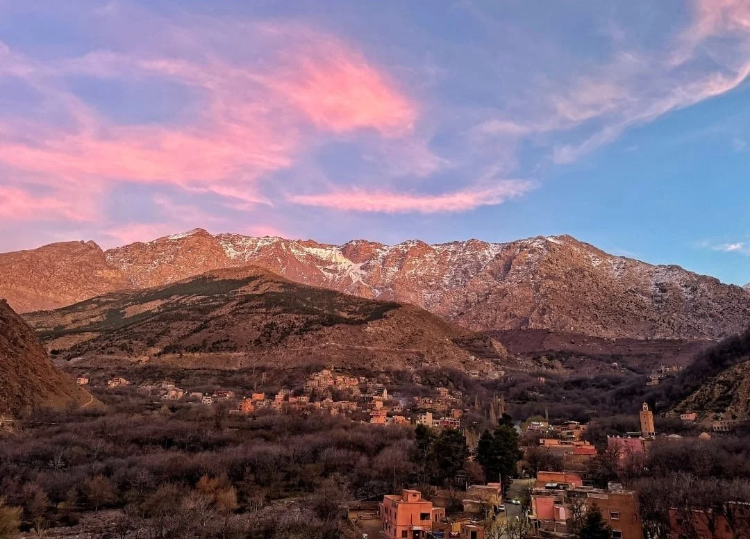 The Imlil Valley Morocco at sunrise, with its agricultural terraces and traditional water channels.
